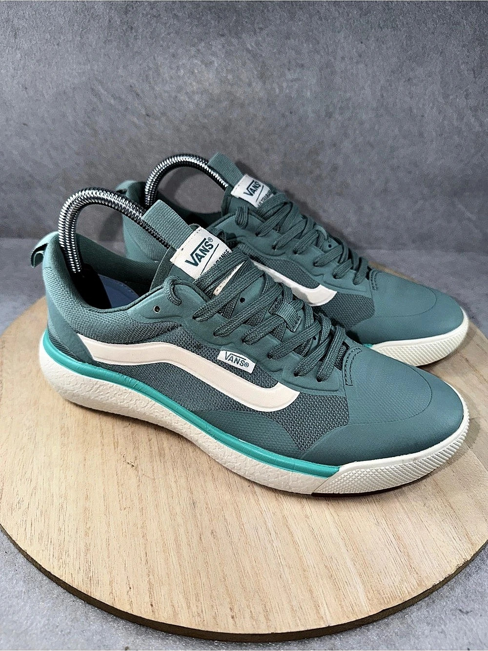 Vans UltraRange low-top sneakers in teal/blue-green with white and aqua accents.